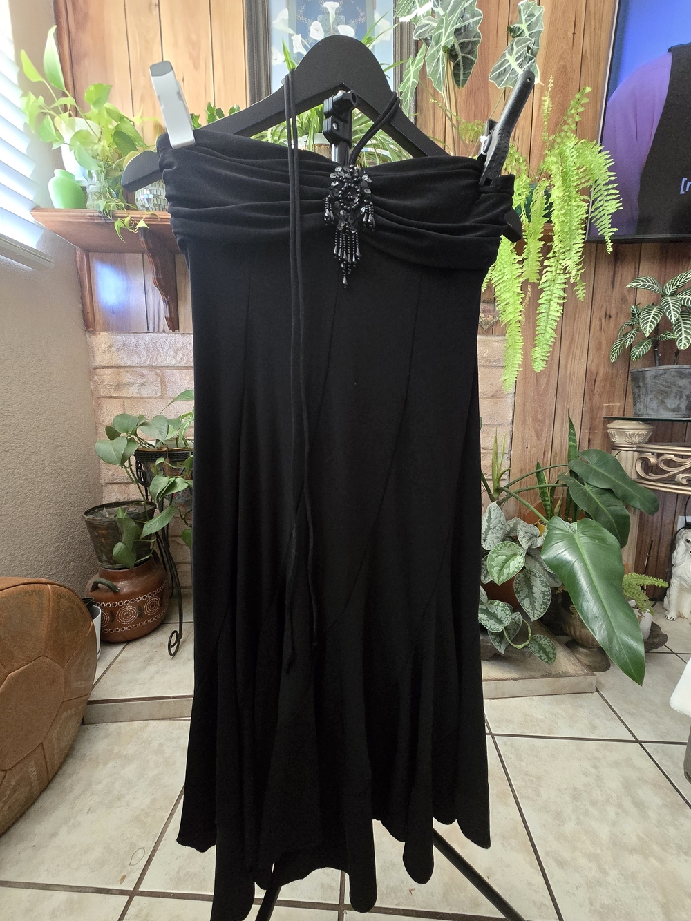 B. Smart Black Strapless Dress with Beaded Accent